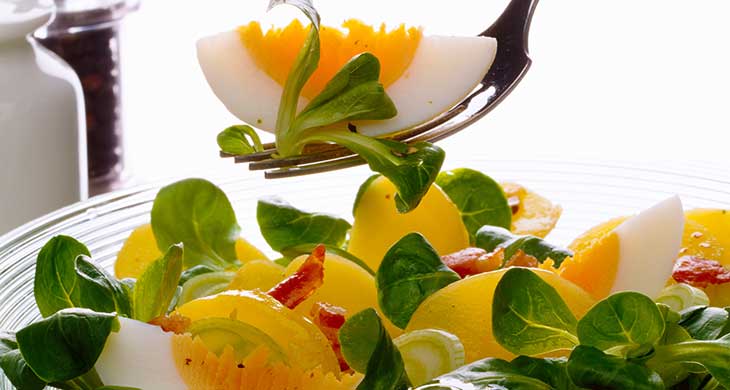 Warm Dressed Salad with Poached Eggs